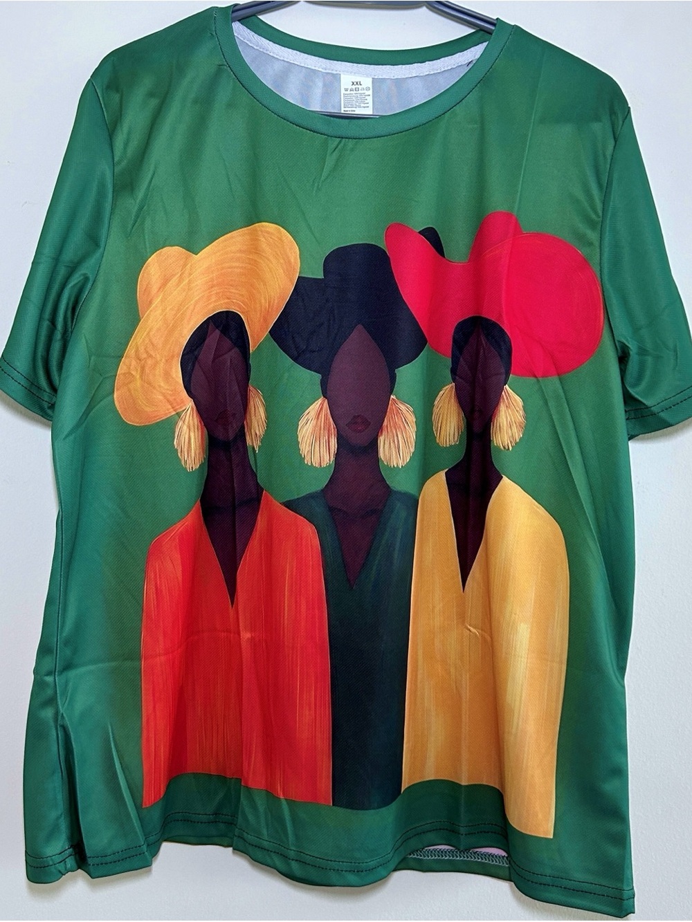Green Graphic Tee with Colorful Trio Art - oversized